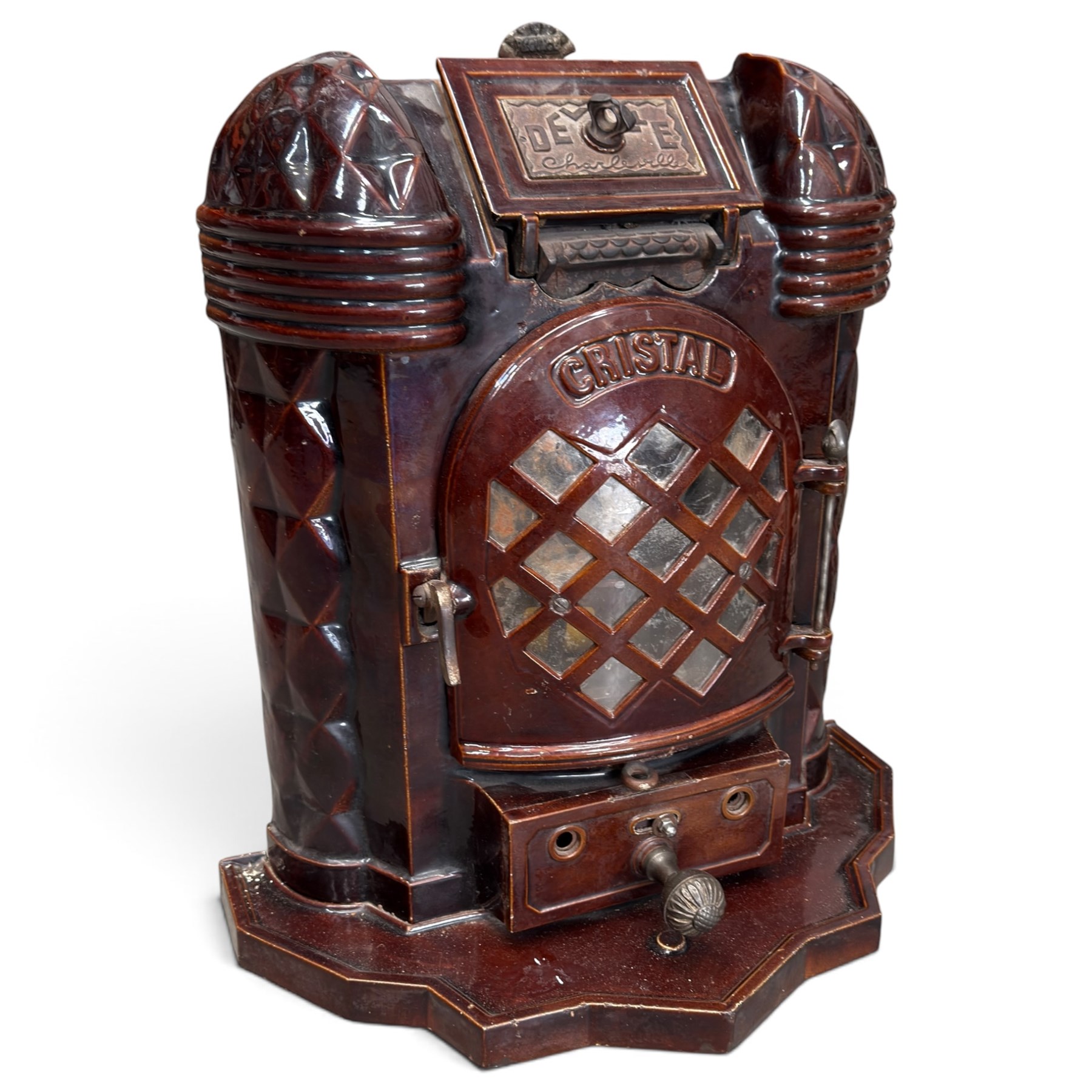 Deville & Cie of Charleville - early 20th century Art Deco cast iron and burgundy enamel 'Cristal' wood burning stove, hinged vent over lattice glazed door and ash drawer, on shaped geometric base, circa 1920