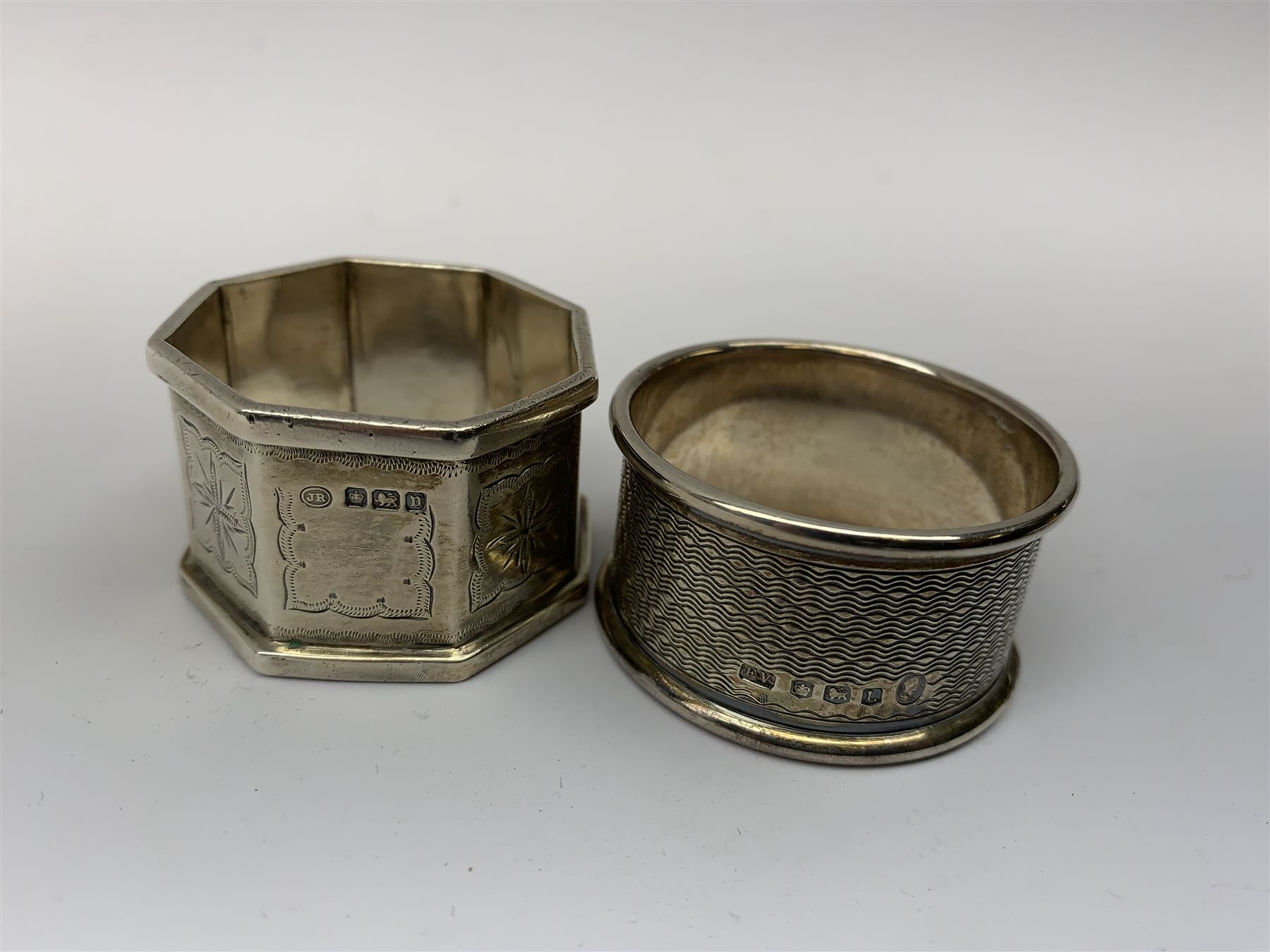 Two silver napkin rings by Collingwood & Sons Ltd, Birmingham 1928 and two other silver napkin rings hallmarked, approx 3.2oz, cased set of silver silver handled knives, hallmarked Sheffield 1915, together with a selection of silver plated flatware, to include Walker and Hall fish eaters set, cased nut cracker set with grape scissors, etc., plus a silver mounted hair brush and hand held mirror, hallmarked Chester 1919