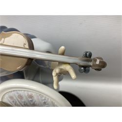 Lladro figure, Jester Serenade, modelled as a ballerina with bouquet of flowers seated before a jester playing the violin, limited edition 2541/3000, sculpted by Antonio Ramos, no 5932, with original box, year issued 1993, year retired 1994, H37cm