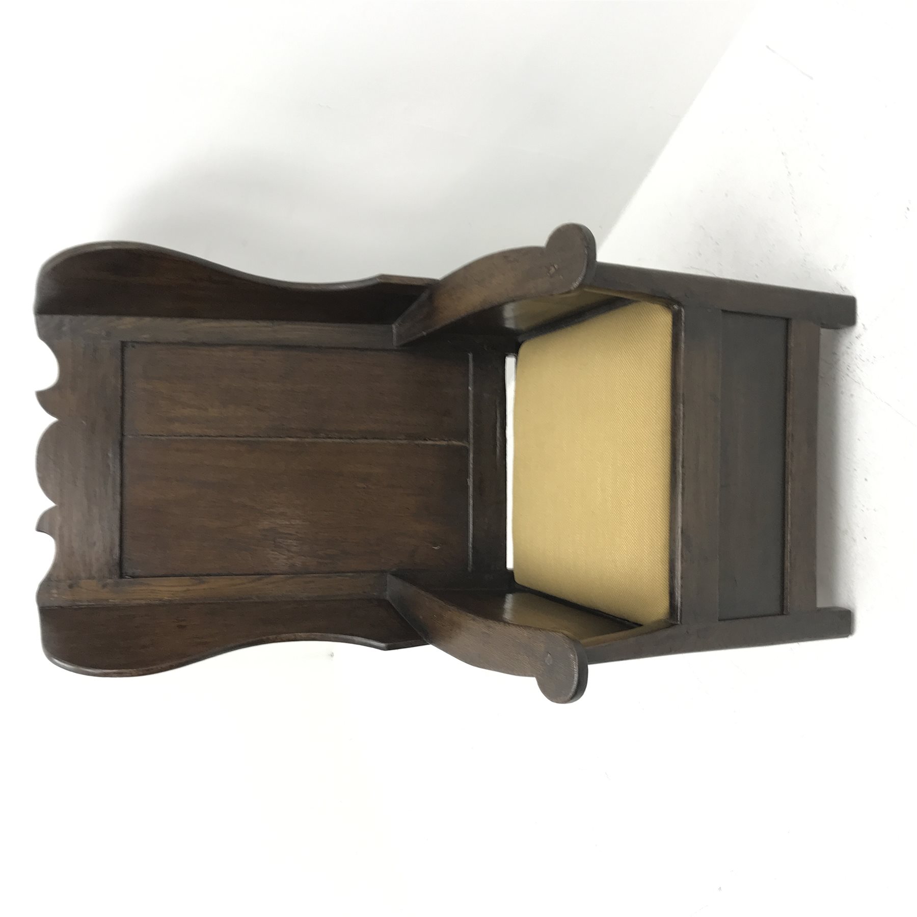 18th century Yorkshire Dales oak lambing chair, shaped cresting rail above panelled wing back, panelled sides and front, drop in upholstered seat cushion, W65cm, H111cm, D80cm