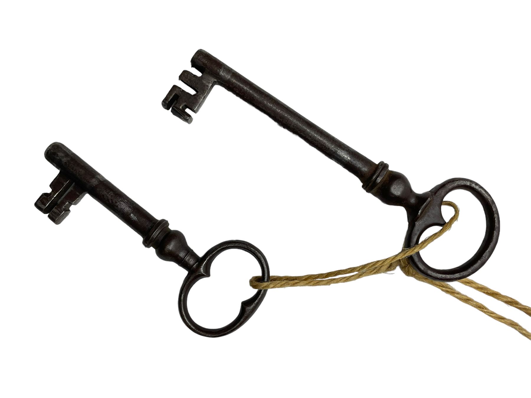 Late 17th century Flemish/Dutch rosewood and oak ‘Zeeuwse Kast’ or cupboard, projecting cornice carved with three putti masks, the uprights carved with lion masks over ribbons, flower heads and foliage, enclosed by four geometric panelled doors, lower central upright carved with flower head over foliate ribbon with bird among foliage, the escutcheon hidden by swivel berry carved cover, interior fitted with shelves, two drawers and shallow hinged cupboard, on two large turned and ebonised feet, circa 1680