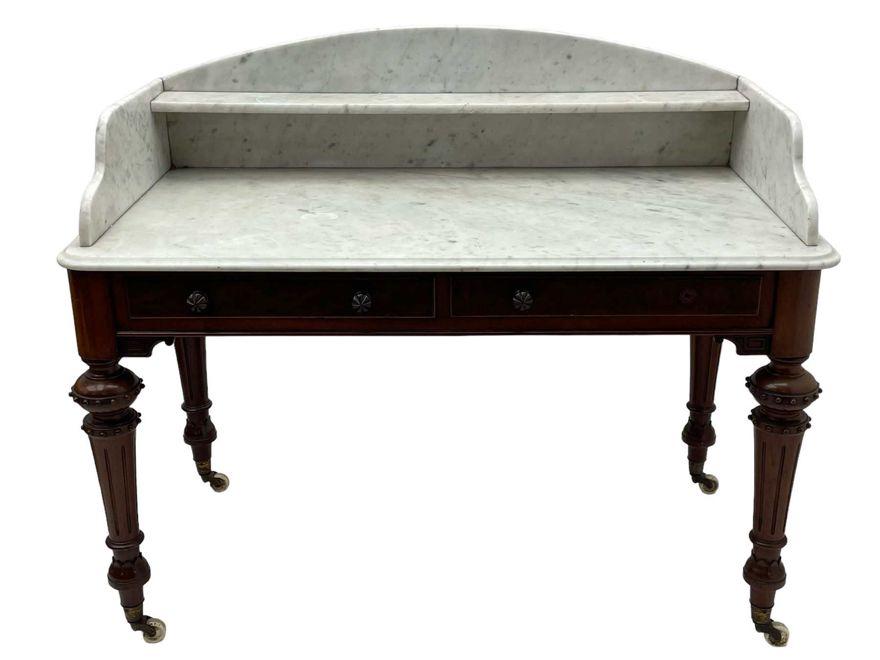 Victorian figured mahogany two-piece bedroom set - the washstand with white and black marble moulded top with arched back and raised shelf, two moulded frieze drawers, on turned and fluted supports with brass and ceramic castors (W123cm, D60cm, H102cm); the dressing table with raised swing mirror in moulded frame with shell and scroll carved pediment, on scrolled horns carved with foliage, four raised trinket drawers over moulded rectangular top, fitted with two drawers, on turned and fluted supports with brass and ceramic castors (W122cm, H177cm, D62cm)