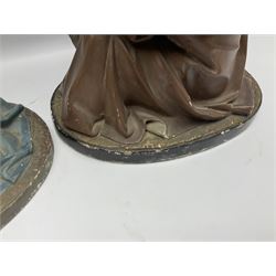 Two religious painted plaster figures of Mary and Joseph kneeling on oval plinths, with impressed mark 'Raffl et Cie Paris', H60cm 