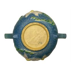 Roseville pottery twin handled bowl, decorated with clematis on a blue ground, marked ‘Roseville USA 457-8’ to the base