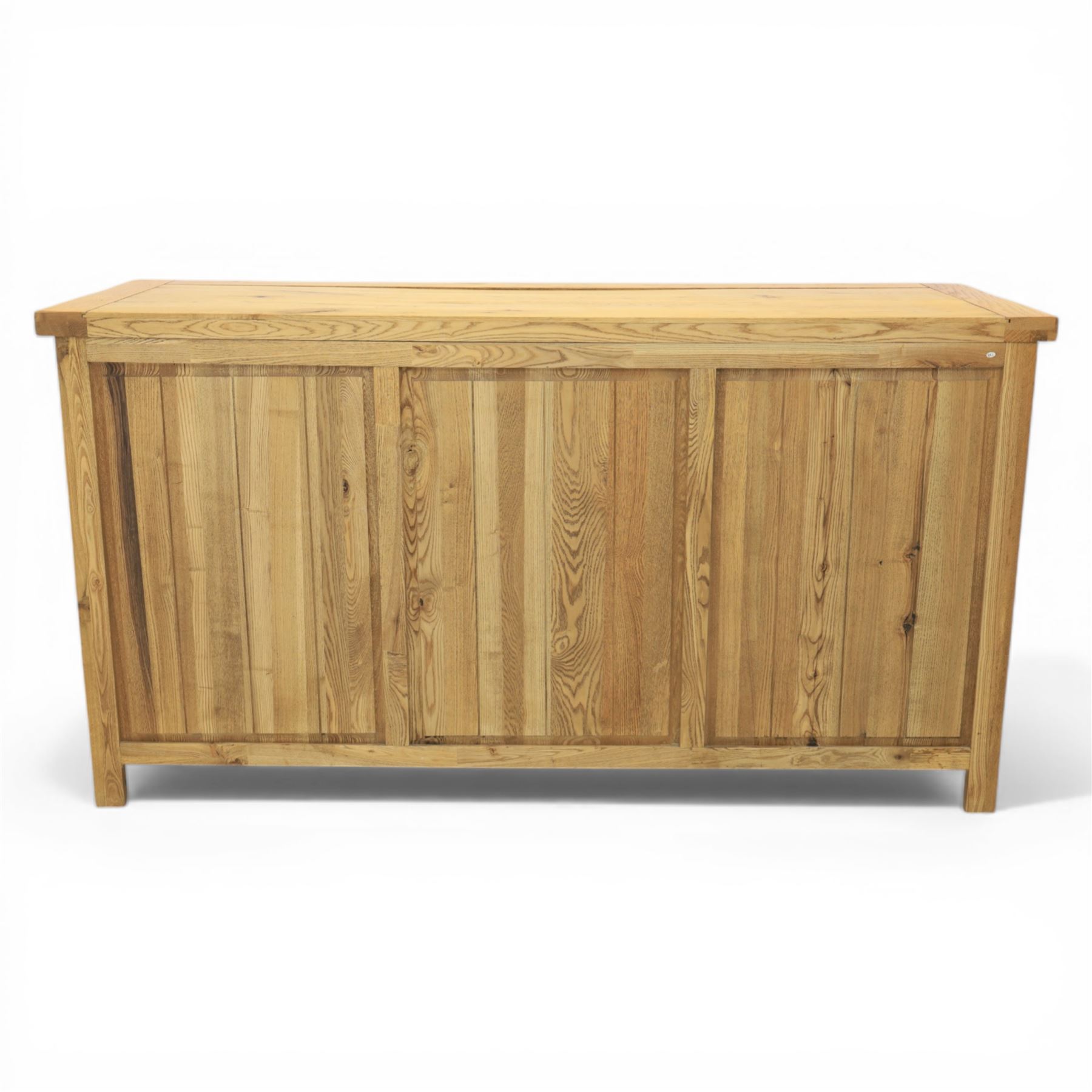 Modern light oak sideboard, fitted with six drawers and two cupboards