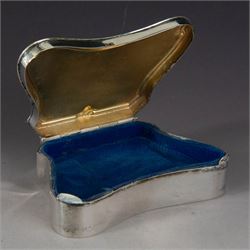 Early 20th century silver mounted jewellery box, with curved front and embossed palmette rim, opening to revel padded interior with weighted base, hallmarked A & J Zimmerman Ltd, Birmingham 1911, H3cm, W11cm