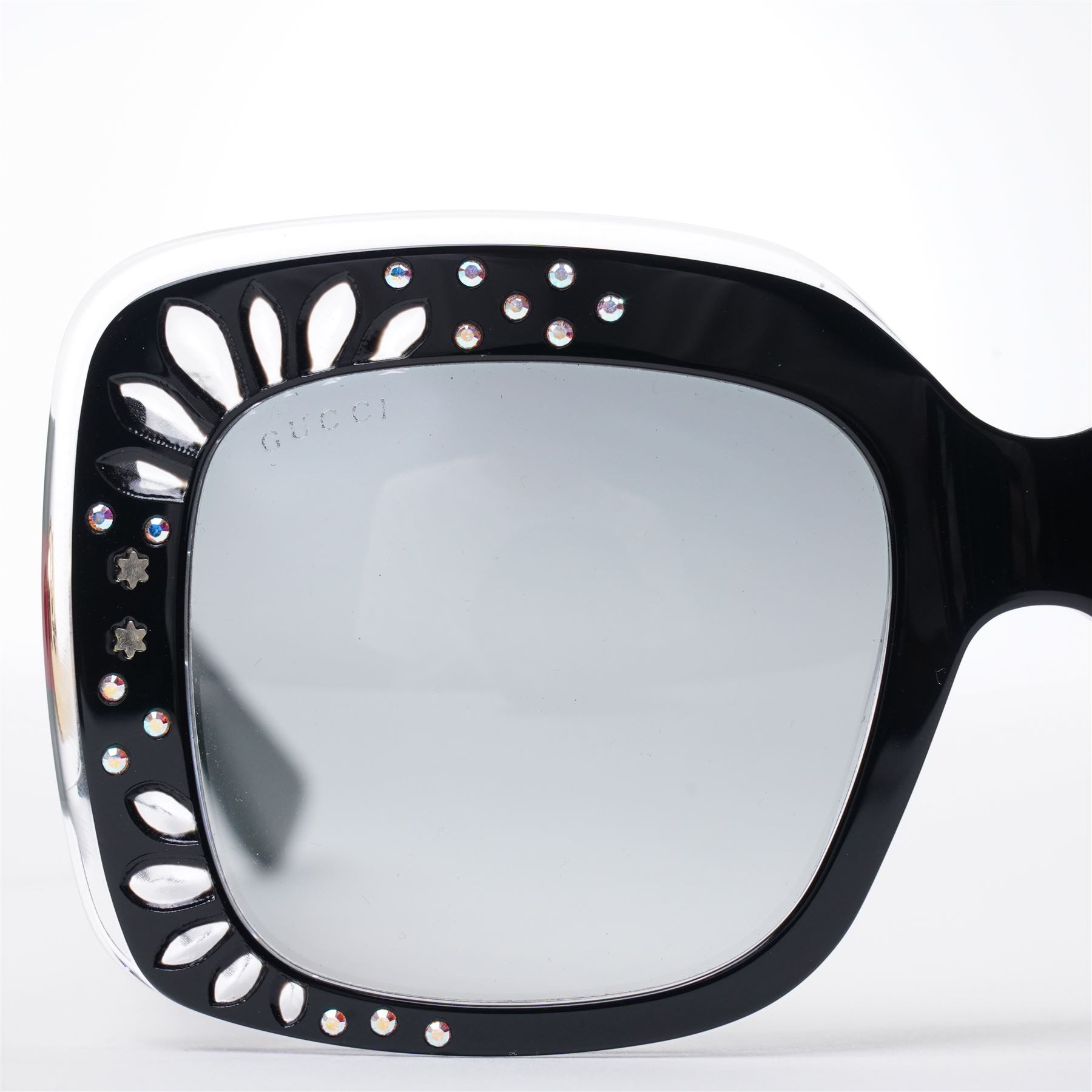 Gucci - pair of oversized black acetate sunglasses, the square frames with studded and crystal embellishment to the front and signature green and red web temples with interlocking gold-tone GG logo and bee motif, unused with original velvet pouch and box