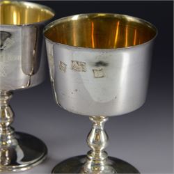 Pair of limited edition silver goblets, commemorating the 1900th  founding of the city of York by, the plain bowl with gilt interior and engraved with York crest dated AD71-1971, upon knopped stem and circular domed foot, hallmarked Barker Ellis Silver Co, Birmingham 1970, H11cm