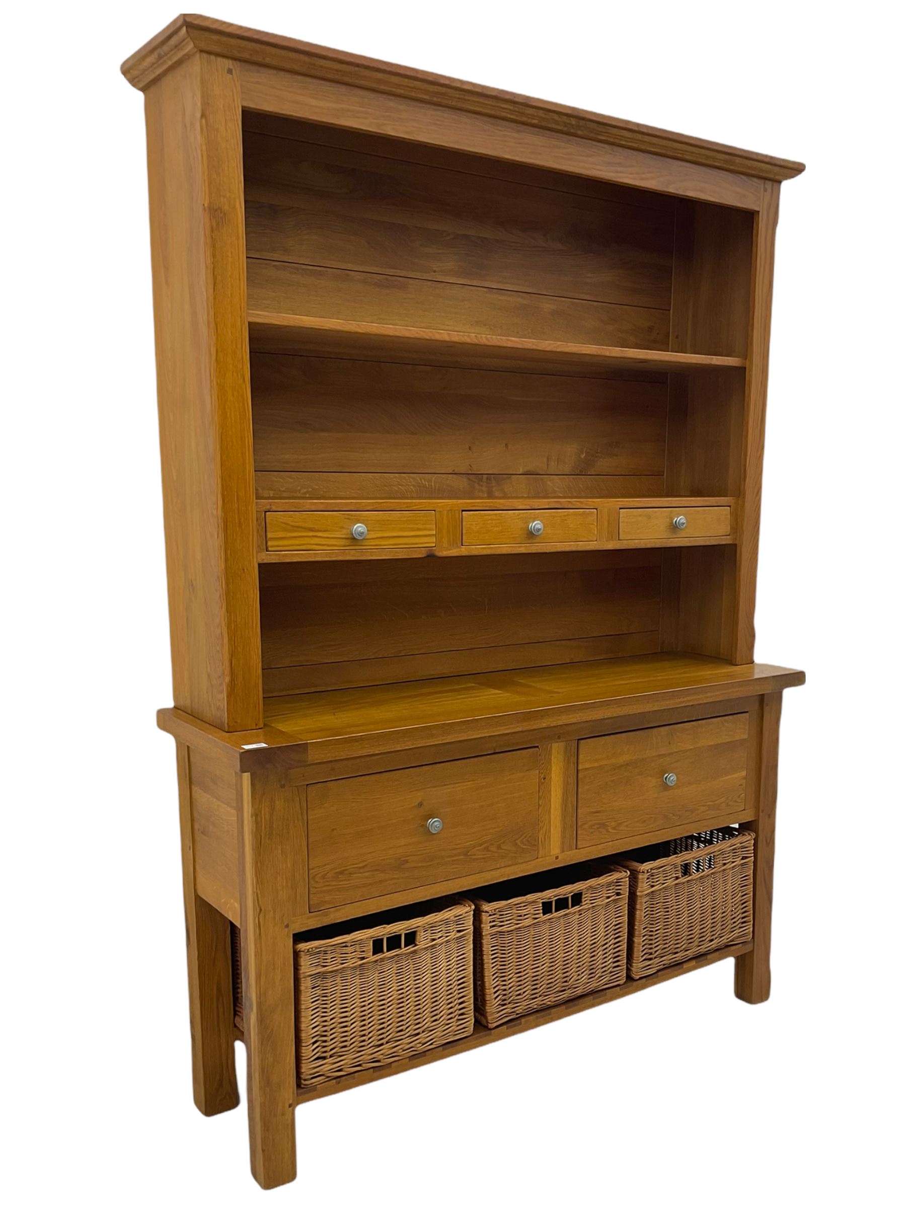 Manor Oak - light oak dresser and rack, fitted with two shelves with three drawers, two deep drawers and pot baked base with basket storage