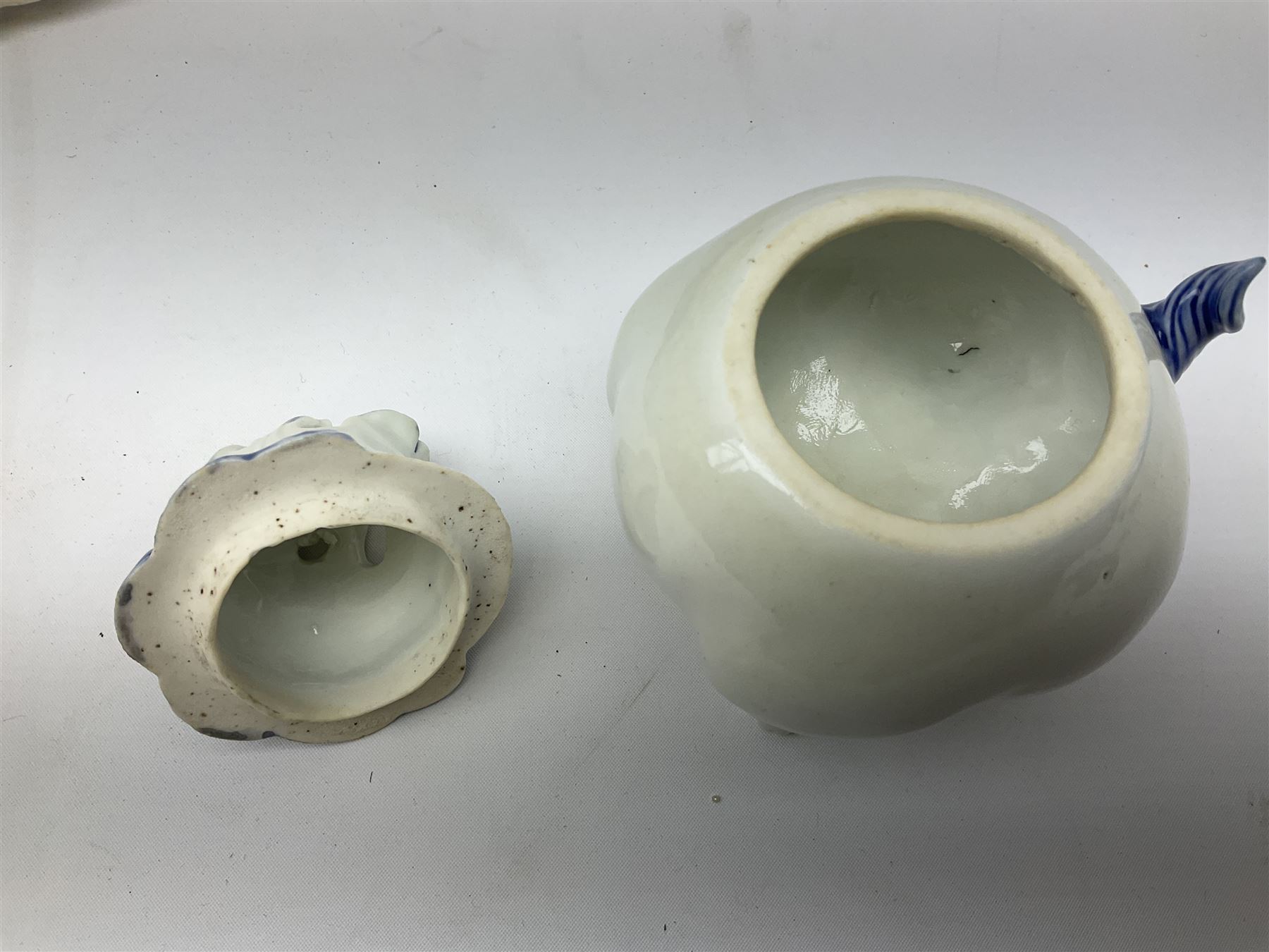 Japanese Hirado blue and white porcelain censer in the form of a Lion Dog, together with a Hirado porcelain shell shaped dish, centrally decorated with an exotic bird flanked by two roundels on floral scroll ground, censer H13cm