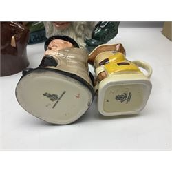 Collection of toby jugs and character jugs, to include Royal Doulton Winston Churchill and Neptune, together with Staffordshire Character Jugs examples  