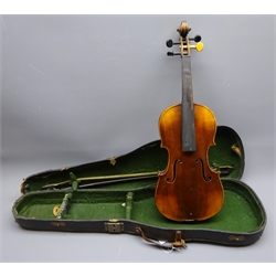  Late 19th/early 20th century continental violin with 36cm two-piece maple back and ribs and spruce top, bears label 'Joseph Guarnerius Fecit in Cremona Anno 170?' L59.5cm overall, in carrying case with bow  