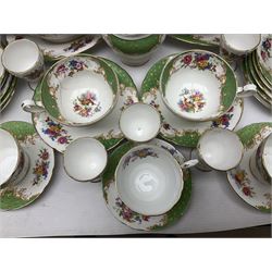 Paragon Rockingham pattern part tea and dinner service including three teapots, milk jug, cups and saucers of various sizes, ten soup bowls, ten side plates, ten dinner plates etc (96)