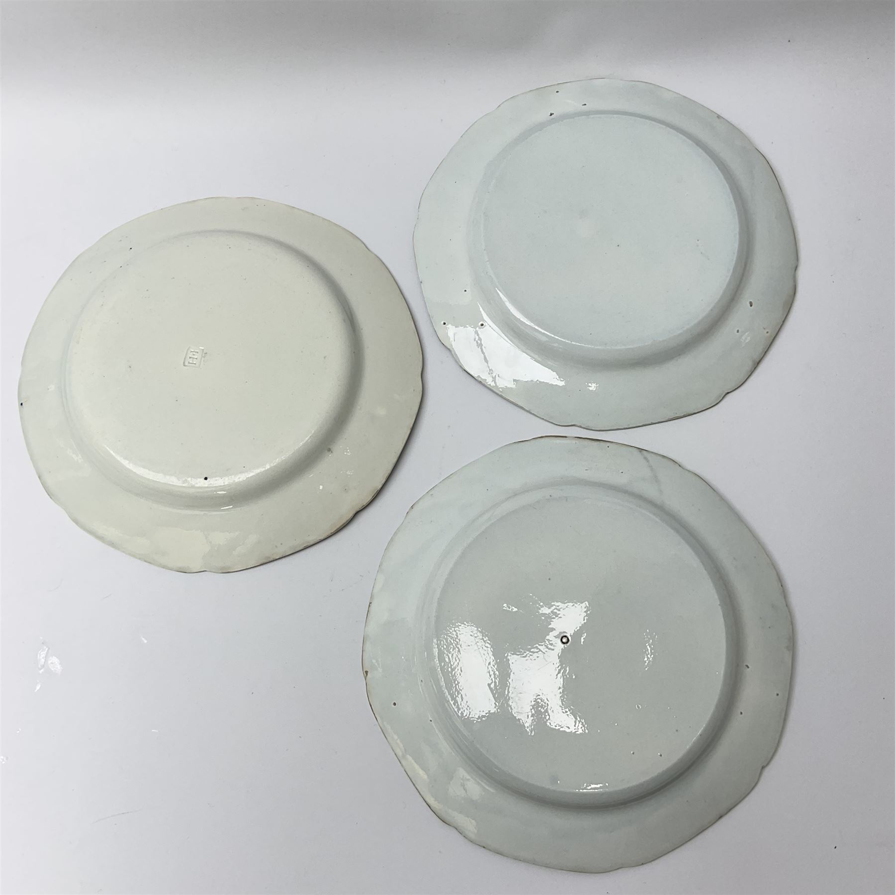 A group of 19th century blue and white transfer printed pottery, various makers and patterns, to include Minton Queen of Sheba pattern plate, Joshua Heath Reindeer pattern plate with towering pagoda, and seal in the foreground, a number of plates decorated in the Chinoiserie Bridgeless pattern, two Mandarin type pattern plates, possibly Spode, etc. 