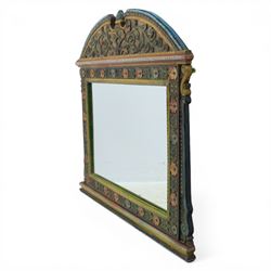 Late 20th century Venetian style polychrome carved wall mirror, arched cresting with central shell motif and scrolling foliate decoration, moulded frame with carved floral borders in relief, enclosing rectangular mirror plate, shaped sides with scroll terminals