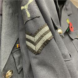 Two post-WWII British Army No.2 Dress tunics, one with Green Howards buttons; army shirt dated 1951; Royal Fleet Auxilliary jacket with trousers; three RAF/WAAF uniforms and RAF Greatcoat; and three canvas/webbing bags, two dated 1943 & 1945