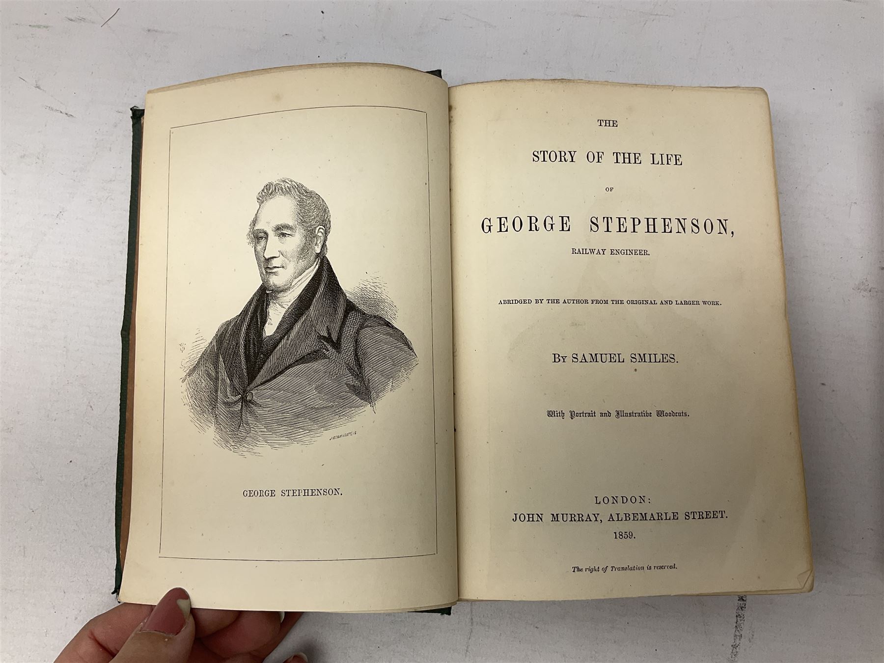 Smiles, S; 'The Story of the Life of George Stephenson' pub John Murray 1859 & Reynolds M 'Locomotive engine Driving' pub Crosby Lockwood 1880, both gilt, 2 volumes