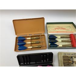 Nineteen sets of dartboard darts by Unicorn, Jim Pike, 'One-o-One', Farebrother etc, with various flights, shafts, styles and weights; predominantly boxed