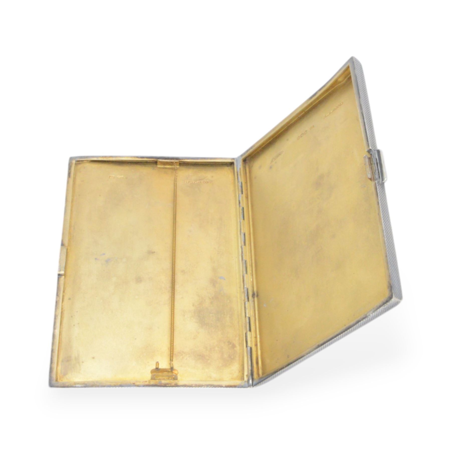 1930s silver cigarette case, of rectangular form, with engine turned decoration, with engraved initials to the centre, hallmarked Walker & Hall, Sheffield, 1937, L13cm