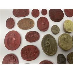 Large and impressive collection of Grand Tour cameos and intaglios (impronte), mostly red plaster examples