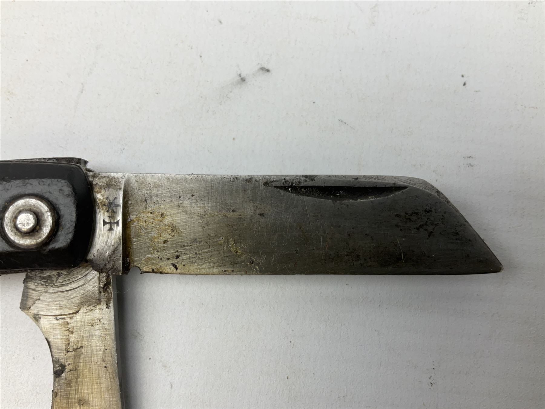 WW2 British army folding jack/clasp knife with blade and can opener marked with broad arrow and date 1944; a similar unmarked British army folding three-blade knife; and another later similar British Army knife marked Wade & Butcher Sheffield England (3)