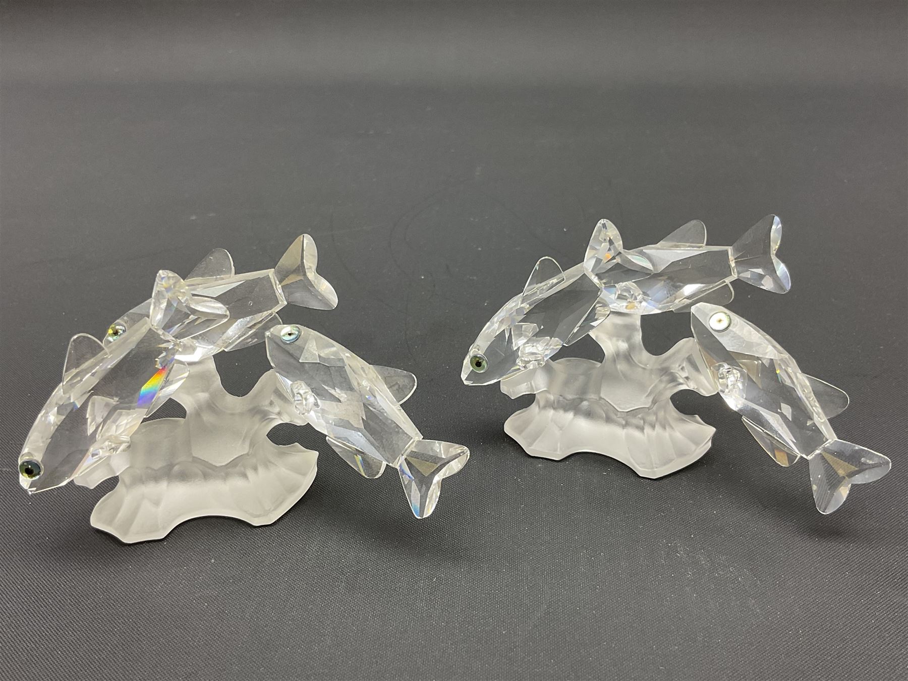 Swarovski Crystal sea creatures, comprising lion fish and dolphin, both with coloured elements, together with two seahorses, two small fish groups, butterfly fish, longnose butterfly fish and six coloured shells, tallest H8.5cm