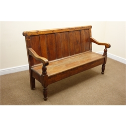  19th century country pine hall bench seat, five panel back with moulded top rail and shaped arms, planked seat on turned tapering supports, squab seat cushion, W158cm, D57cm, H96cm  