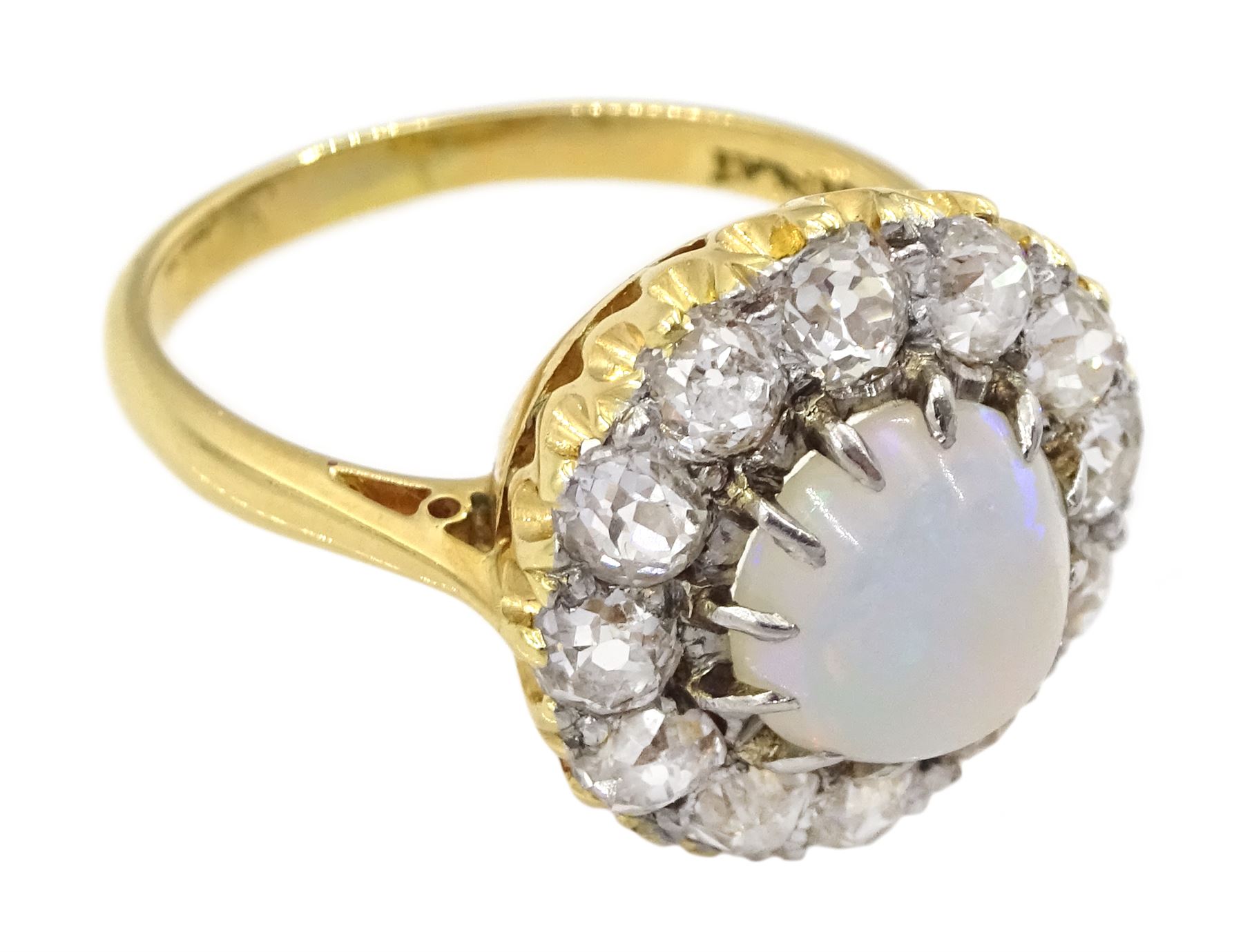 Early 20th century opal and old cut diamond cluster ring, stamped 18ct Plat, total diamond weight approx 1.00 carat