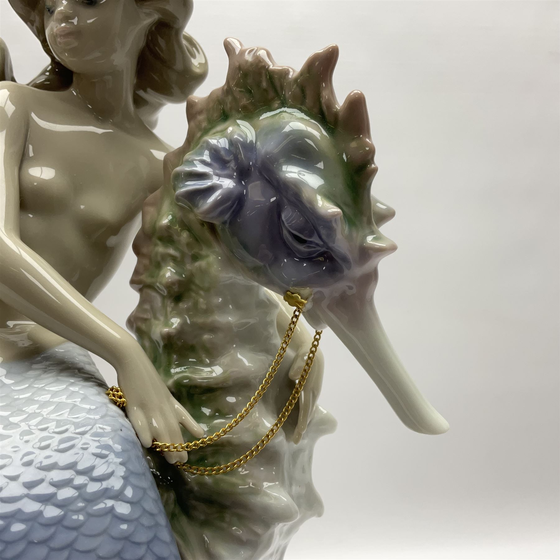 Lladro figure, Beneath the Waves, modelled as a mermaid and seahorse upon a wooden plinth, no 1822, limited edition 1389/2500, with certificate and original box, H32cm 