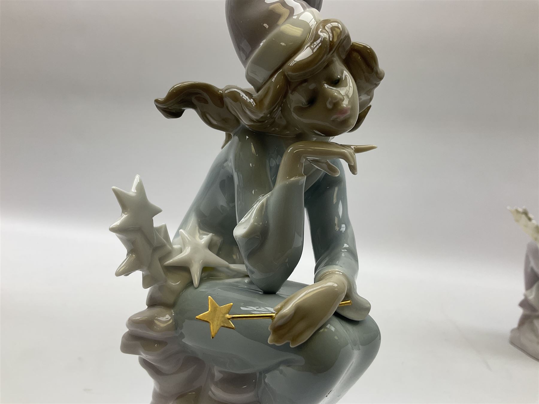 Lladro Star Bright Girl set, comprising Wishing on a Star no 1475, Starlight Starbright no 1476 and Stargazing  no 1477, all in original boxes, largest example H19cm