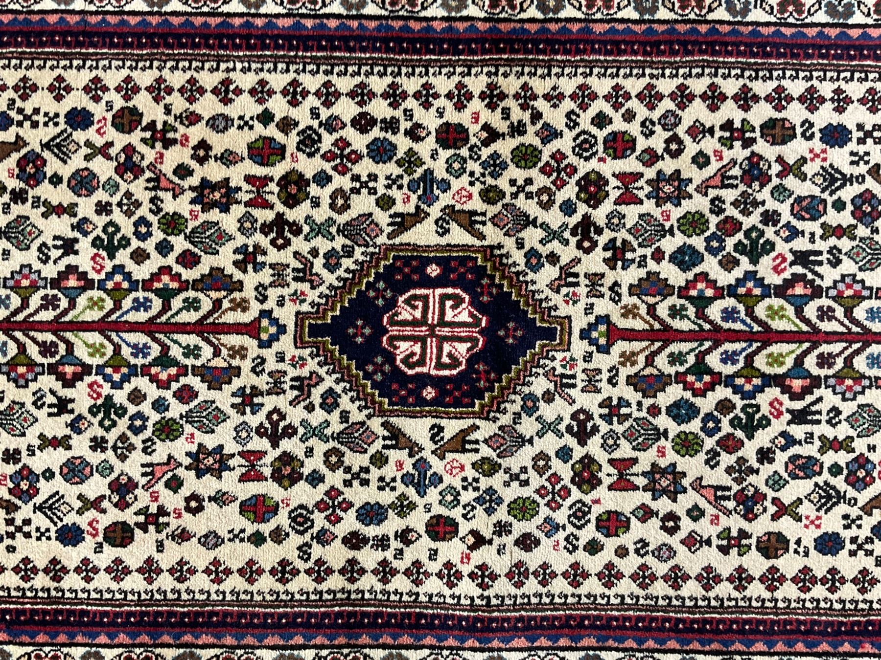 Persian Abadeh indigo ground runner rug, ivory field with pole medallion surrounded by plant and bird motifs and contrasting spandrels, border with interlaced flowerheads