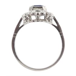 Platinum sapphire and diamond oval panel ring, with diamond set shoulders, total diamond weight approx 0.85 carat