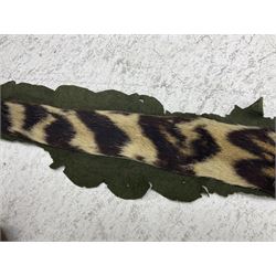 Skins/Hides: Victorian Tiger skin rug (tigris tigris), with green backing with scalloped edges,  L188cm  
