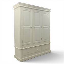 Modern white three door wardrobe, with two hanging section and shelving area, above a long...