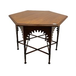 Liberty & Co circa 1890 - walnut centre table, hexagonal form, fretwork frieze, star stretcher base, turned supports on button feet. Stamped on underside.
Featured in - Pictorial Dictionary of British 19th century Furniture Design, Daryl Bennett Liberty's Furniture, 1875-1915, The Birth of Modern Design.
Liberty Style, The Classic Years, 1898 - 1910, by Mervin Levy.