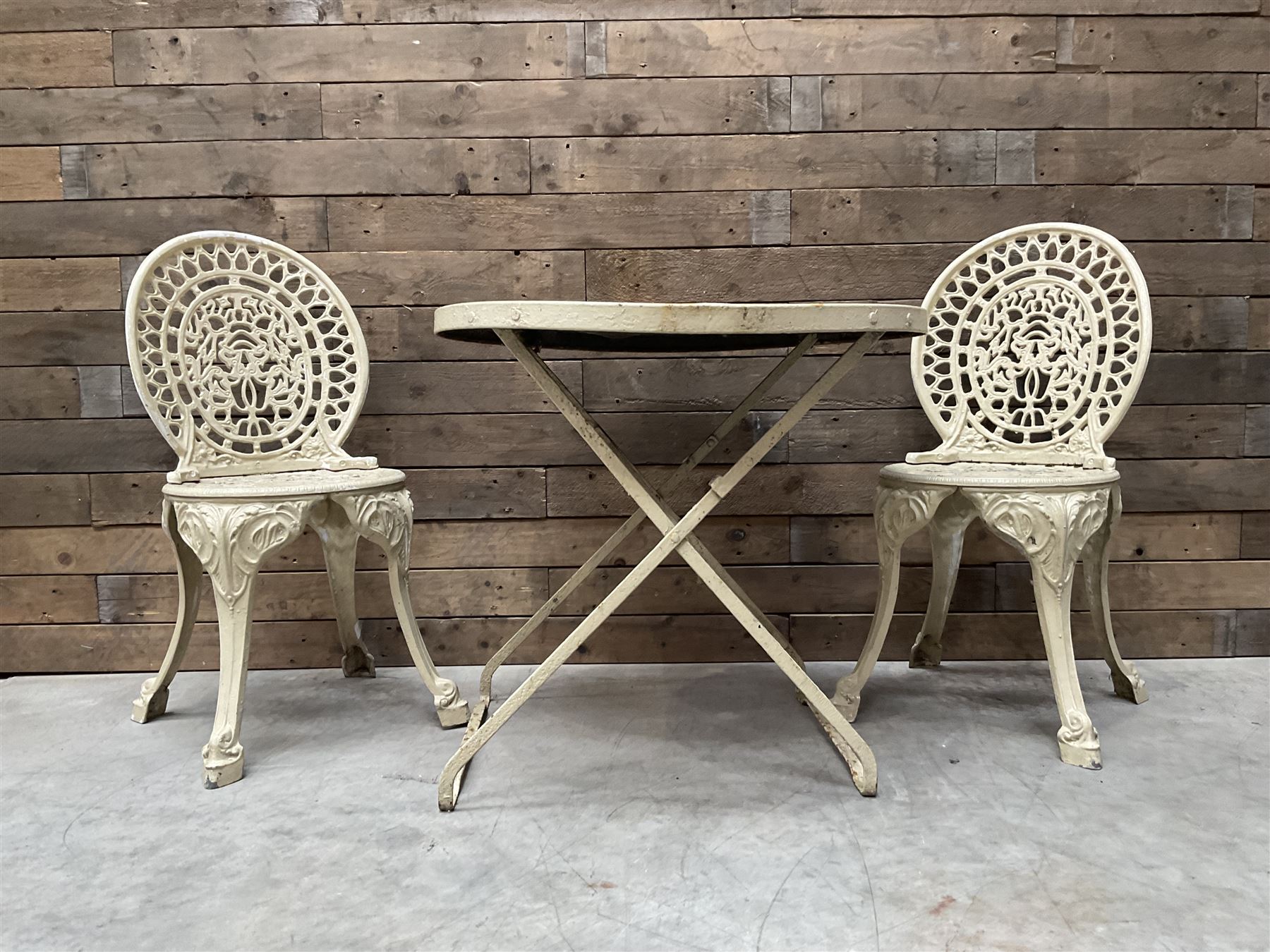 Circular cast aluminium garden table (D74cm, H68cm), and two chairs