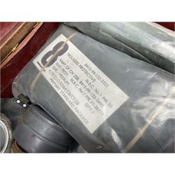 Early 20th century leather suitcase marked to the top 'Major P.M. Newton R.E. Crossways, Bridlington, East Yorkshire' 60 x 40cm; another similar leather suitcase marked W.D. to the lid; three post-WW2 respirators; and three unopened pairs of British Army N.B.C. (Nuclear Biological Chemical) No.1 Mk.III Trousers Protective (8)