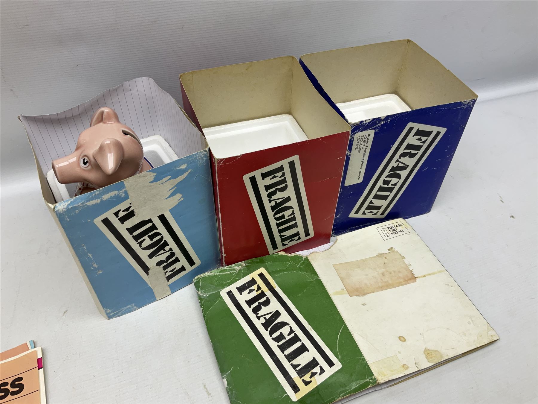 Set of five Wade NatWest money boxes, comprising father, mother, boy, girl and baby, four with original boxes 