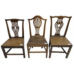 Three 19th century country elm chairs, each with shaped and pierced splats 