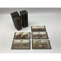 Early 20th century hand held slide action stereoscope viewer, Underwood & Underwood, publishers: The South African War through the stereoscope, stereo photographs mounted on card and captioned, in two double volume book form boxes with title labels and Underwood & Underwood  publishers: Hunting series through the stereoscope, stereo photographs mounted on card and captioned, in a single volume book form box   