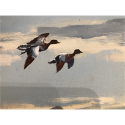  Sir Peter Markham Scott, CH CBE FRS (British 1909-1989): 'Widgeon over Cley Marshes- Evening Flight', oil on board signed, original title label verso 49cm x 75cm   DDS - Artist's resale rights may apply to this lot  