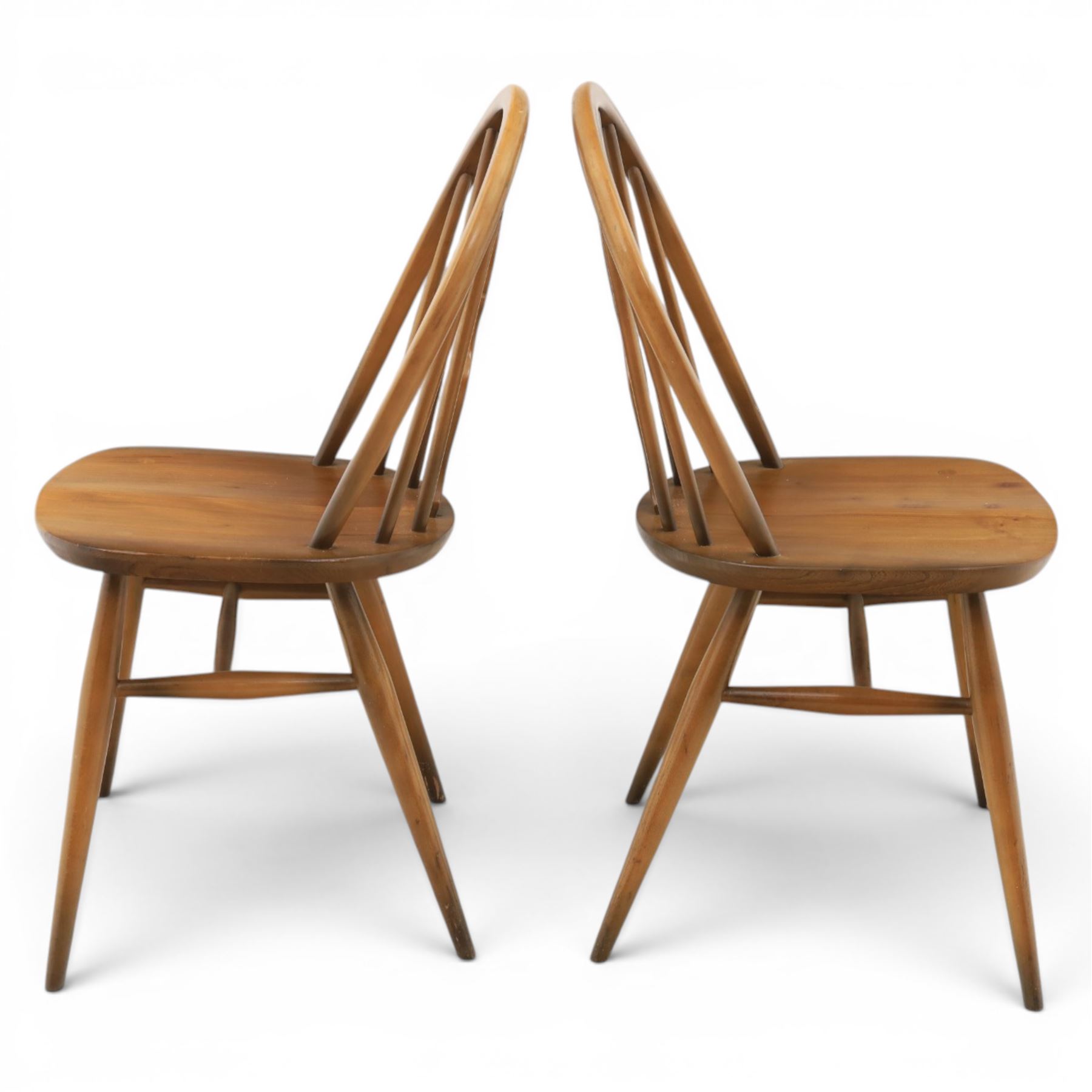 Ercol - Set of four dark elm 'Fleur De Lys' chairs