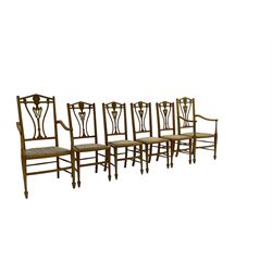 Set six (4+2) Edwardian satinwood dining chairs, triangular cresting rail painted with laurel wreath, shaped and pierced splat flanked by two shaped upright rails, with boxwood stringing, upholstered seats, on square tapering front supports with spade feet