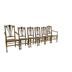 Set six (4+2) Edwardian satinwood dining chairs, triangular cresting rail painted with laurel wreath, shaped and pierced splat flanked by two shaped upright rails, with boxwood stringing, upholstered seats, on square tapering front supports with spade feet