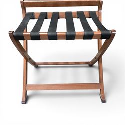 Ten walnut finish folding luggage stands