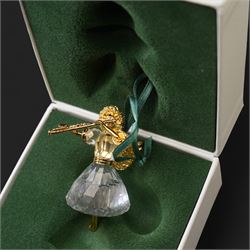 Twelve Swarovski crystal 'Christmas' and 'Crystal' Memories ornaments, comprising Moon, Sun, Boot, Candy Cane, Christmas Wreath, Pinecone and Holly etc, boxed and with sleeves (12)
