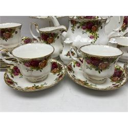 Royal Albert Old Country Roses pattern tea service for six, comprising teapot, sucrier, milk jug, dessert plates, one cake plate, one two tiered cake stand, salt and pepper pots and bud vase 