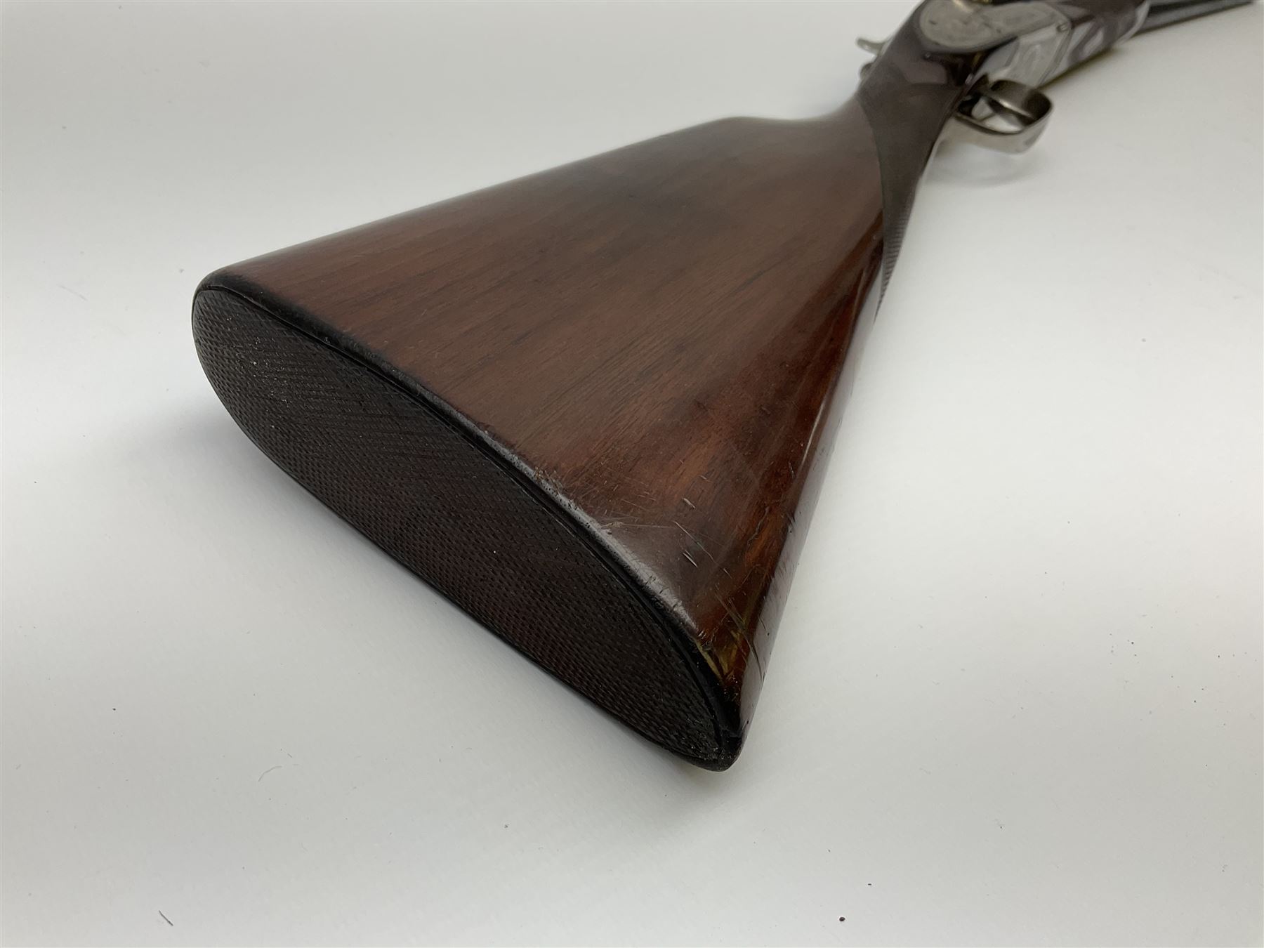 Gunmark Silver Sabel De Luxe 12-bore side by side double barrel side lock ejector sporting gun, 68.5cm barrels with 2.75cm chambers and matt bluing, walnut stock with chequered grip and fore-end and thumb safety, serial nos.12509 & 100.085, L111.5cm overall SHOTGUN CERTIFICATE REQUIRED