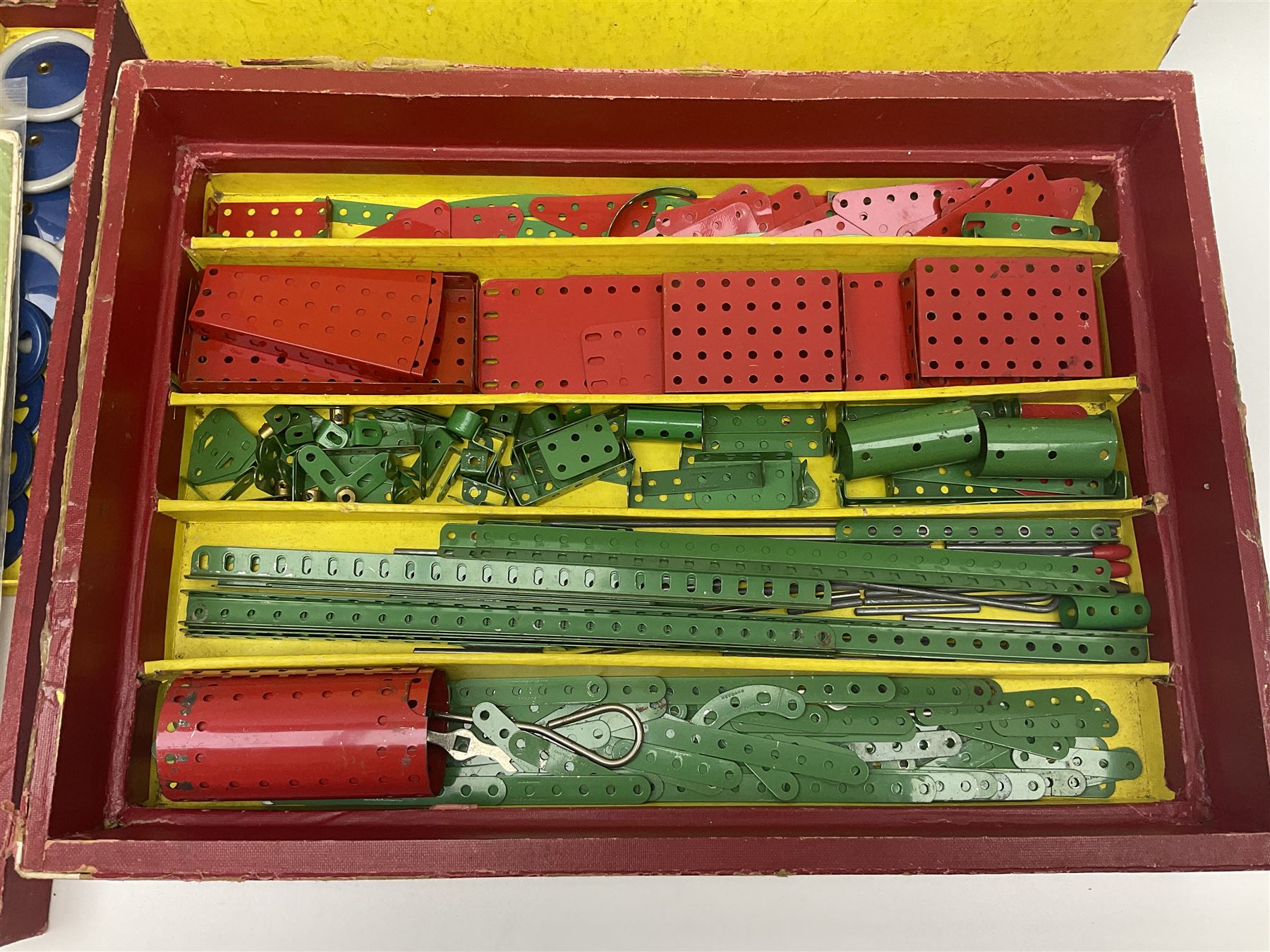 Meccano Outfit No.9 - with good quantity of red and green plates, strips, wheels, brackets, trunnions, tyres, cylinders etc; original box with lift-out tray and instruction manual
