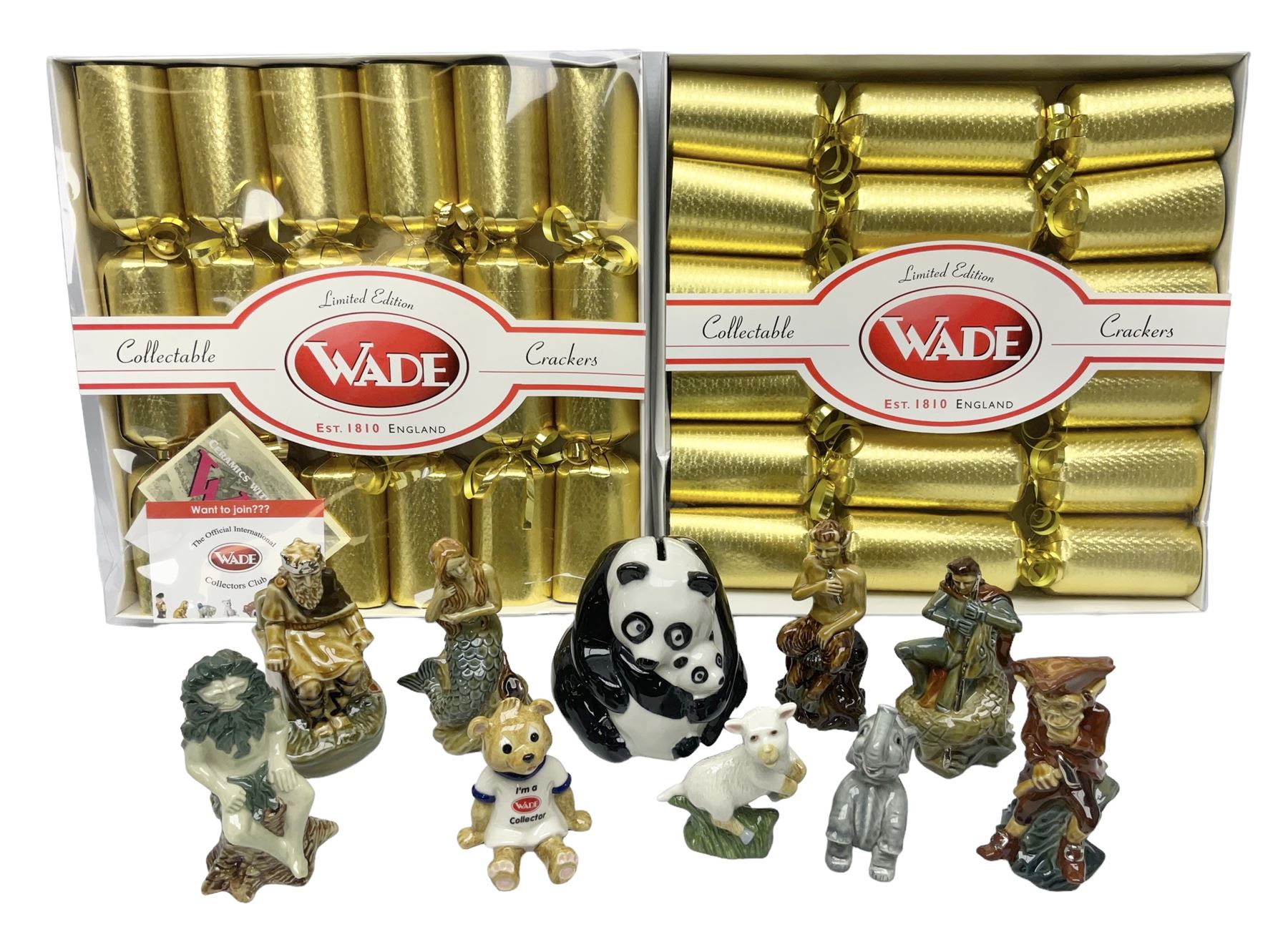 Nine Wade Collectables figures, comprising six Myths and Legends; King Canute, Mermaid, St George, Cornish Tin Mine Pixie, Puck and Green man, together with Lamb, Elephant and bear, a Wade Panda money box and two boxes of Wade Christmas Crackers